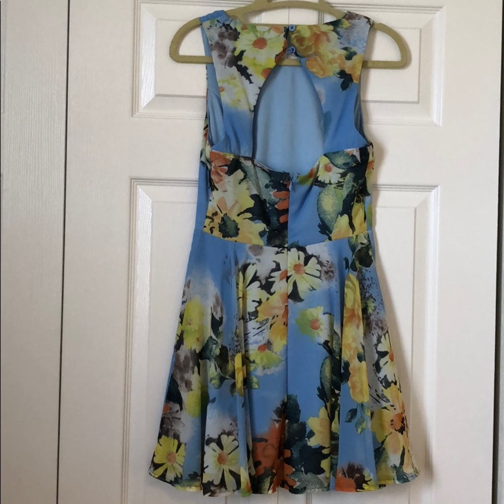 Floral dress with flowy bottom and open back